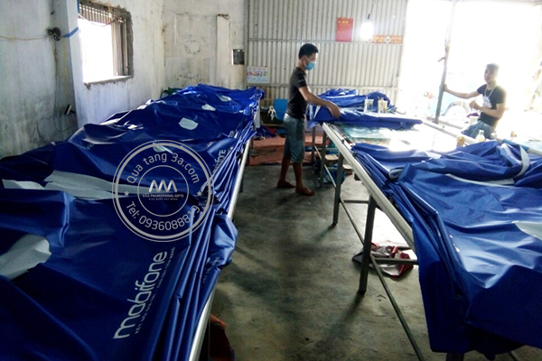 xưởng sản xuất áo mưa quà tặng 3